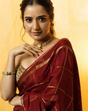 Elegant Actress Ashika Ranganath in a Maroon Silk Saree with Gold Border Photos 01
