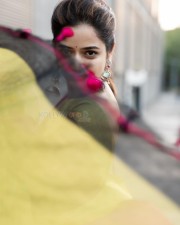 Elegant Ashika Ranganath in a Black Saree and Pink Sleeveless Blouse Pictures 04