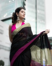 Elegant Ashika Ranganath in a Black Saree and Pink Sleeveless Blouse Pictures 05