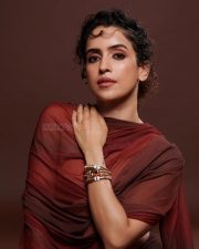 Elegant Sanya Malhotra in a Rust Tube Top Skirt and Sheer Dupatta for Filmfare Photos 01