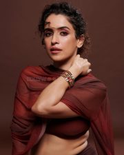 Elegant Sanya Malhotra in a Rust Tube Top Skirt and Sheer Dupatta for Filmfare Photos 03