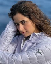 Enigmatic Actress Ashika Ranganath in a White Puffer Jacket Photos 01