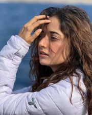 Enigmatic Actress Ashika Ranganath in a White Puffer Jacket Photos 02