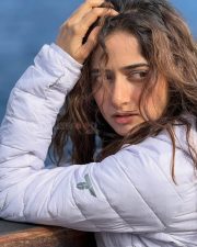 Enigmatic Actress Ashika Ranganath in a White Puffer Jacket Photos 04
