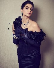 Fashion Diva Sonam Kapoor in a Black Dress Photos 01