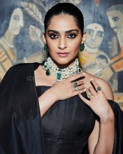 Fashion Diva Sonam Kapoor in a Black Dress Photos 02
