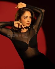 Fiery Sandeepa Dhar Cleavage in a Black Sheer Mesh Bodysuit Photos 04