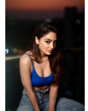 Hot and Trendy Sandeepa Dhar Showing Cleavage in Blue Bralette Pictures 02
