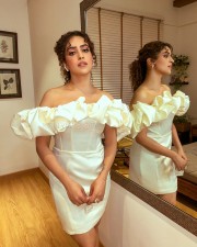 Jawan Movie Actress Sanya Malhotra in a White Shoulder Dress Photos 02