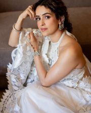 Jinguchaa Actress Sanya Malhotra in a Sheery Ivory Saree with a Backless Halter Neck Blouse Pictures 02