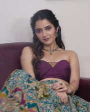 Kannada Heroine Ashika Ranganath in a Purple Crop Top with a Teal Blue Flared Skirt Photos 05