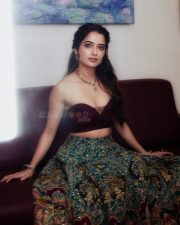 Kannada Heroine Ashika Ranganath in a Purple Crop Top with a Teal Blue Flared Skirt Photos 06