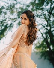 Mallige Hoova Actress Ashika Ranganath in a Light Peach Saree with a Short Sleeved V Neck Blouse Photos 04
