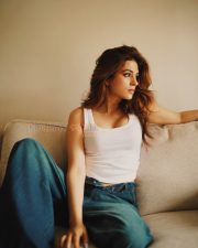 Moody Actress Shraddha Das in a White Ribbed Tank Top and Dark Blue Wide Leg Denim Jeans Photos 02 Moody Actress Shraddha Das in a White Ribbed Tank Top and Dark Blue Wide Leg Denim Jeans Photos 02