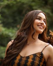 Photogenic Actress Pujita Ponnada in a Black Orange Printed Sundress Photos 02