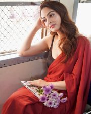 Punjabi Beauty Sandeepa Dhar in a Red Saree with a Black Sleeveless Blouse Photos 01