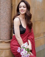 Punjabi Beauty Sandeepa Dhar in a Red Saree with a Black Sleeveless Blouse Photos 03