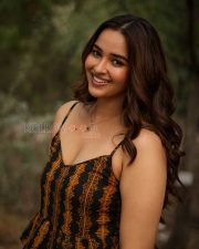 Radiant Actress Pujita Ponnada in a Black Orange Printed Sundress Photos 02