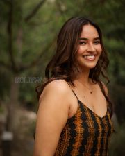 Radiant Actress Pujita Ponnada in a Black Orange Printed Sundress Photos 03
