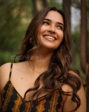 Radiant Actress Pujita Ponnada in a Black Orange Printed Sundress Photos 04
