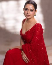 Sardar 2 Actress Ashika Ranganath in a Deep Red Saree with a Matching Sleeveless Blouse Photoshoot Pictures 06