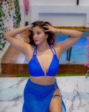 Seductive Archana Singh Rajput Cleavage in a Blue halter bikini and slit skirt Photos 10