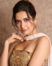 Sexy Beauty Ashika Ranganath in a Gold Embroidered Strapless Top with a White Skirt Photos 01