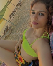 Sexy Bombshell Shraddha Das in a Neon Bikini Photos 04