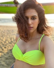 Sexy Bombshell Shraddha Das in a Neon Bikini Photos 05