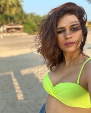 Sexy Bombshell Shraddha Das in a Neon Bikini Photos 06