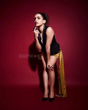 Sexy Sanya Malhotra in a Black V Neck Top and Shiny Mini Skirt Stills 02
