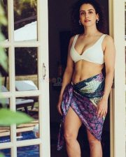 Sexy Sanya Malhotra in a White Bikini Top with a Colorful Patterned Sarong Photo 01