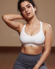 Sexy Sanya Malhotra in a White Sports Bra and Gray Leggings Picture 01