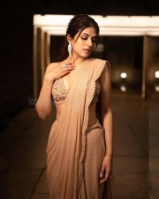 Sexy Shraddha Das in a Beige Saree with Sleeveless Blouse Pictures 02