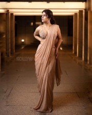Sexy Shraddha Das in a Beige Saree with Sleeveless Blouse Pictures 07