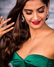 Sexy Sonam Kapoor Cleavage in Green Dress Photos 01