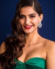 Sexy Sonam Kapoor Cleavage in Green Dress Photos 03