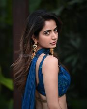 Stylish Actress Ashika Ranganath in a Blue Sleeveless Lehenga Photos 02