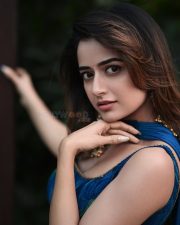 Stylish Actress Ashika Ranganath in a Blue Sleeveless Lehenga Photos 04