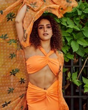 Stylish Sanya Malhotra in a Saffron Beach Wear Photos 01