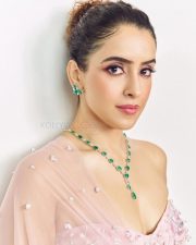 Stylish Sanya Malhotra in a Soft Pink Lehenga with a Strapless Blouse and Sheer Dupatta Photos 03