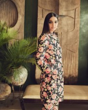 Stylish Sonam Kapoor in a Floral Black Kurta with Full Sleeves and Fitted Trouser Photos 01