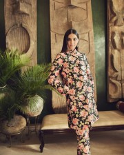 Stylish Sonam Kapoor in a Floral Black Kurta with Full Sleeves and Fitted Trouser Photos 03