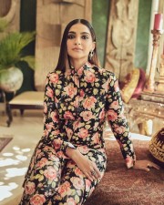 Stylish Sonam Kapoor in a Floral Black Kurta with Full Sleeves and Fitted Trouser Photos 05