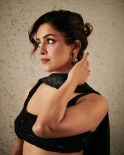 Toaster Actress Sanya Malhotra in a Black Embellished Crop Top with a Matching Skirt Pictures 03