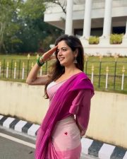 Vishwambhara Heroine Ashika Ranganath in a Light Pink Saree with Heart Prints and White Sleeveless Low Neck Blouse Photos 01