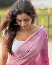 Vishwambhara Heroine Ashika Ranganath in a Light Pink Saree with Heart Prints and White Sleeveless Low Neck Blouse Photos 03