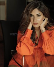 Glamorous Actress Karishma Sharma in a Casual Oversized Orange Shirt Pictures 03