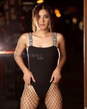 Karishma Sharma in a Single Piece Swimsuit Photo 01