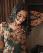 Romeo Actress Mirnalini Ravi in a Floral Printed Flowy Dress Photos 01